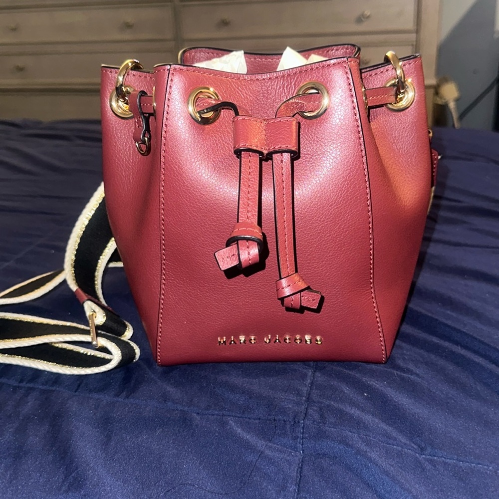 Marc Jacobs bucket burgundy color bag.  Mint condition, only used a few times.